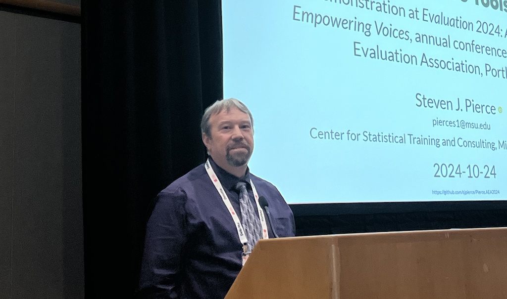 Steven Pierce Presenting on the topic of Reproducible Statistical Analyses and evaluation reports