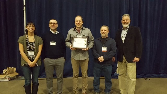 Andrew Dennhardt receives award