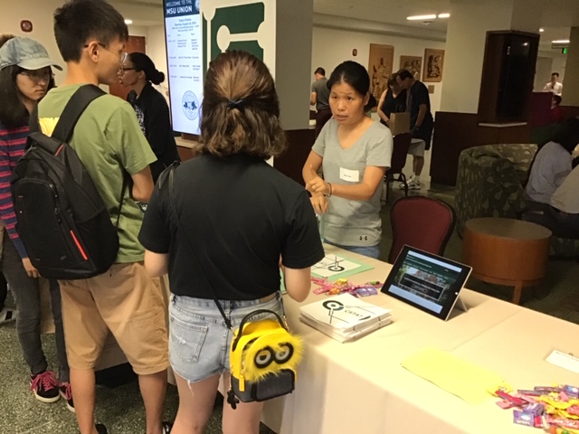 Bing Tong talks to new graduate students.