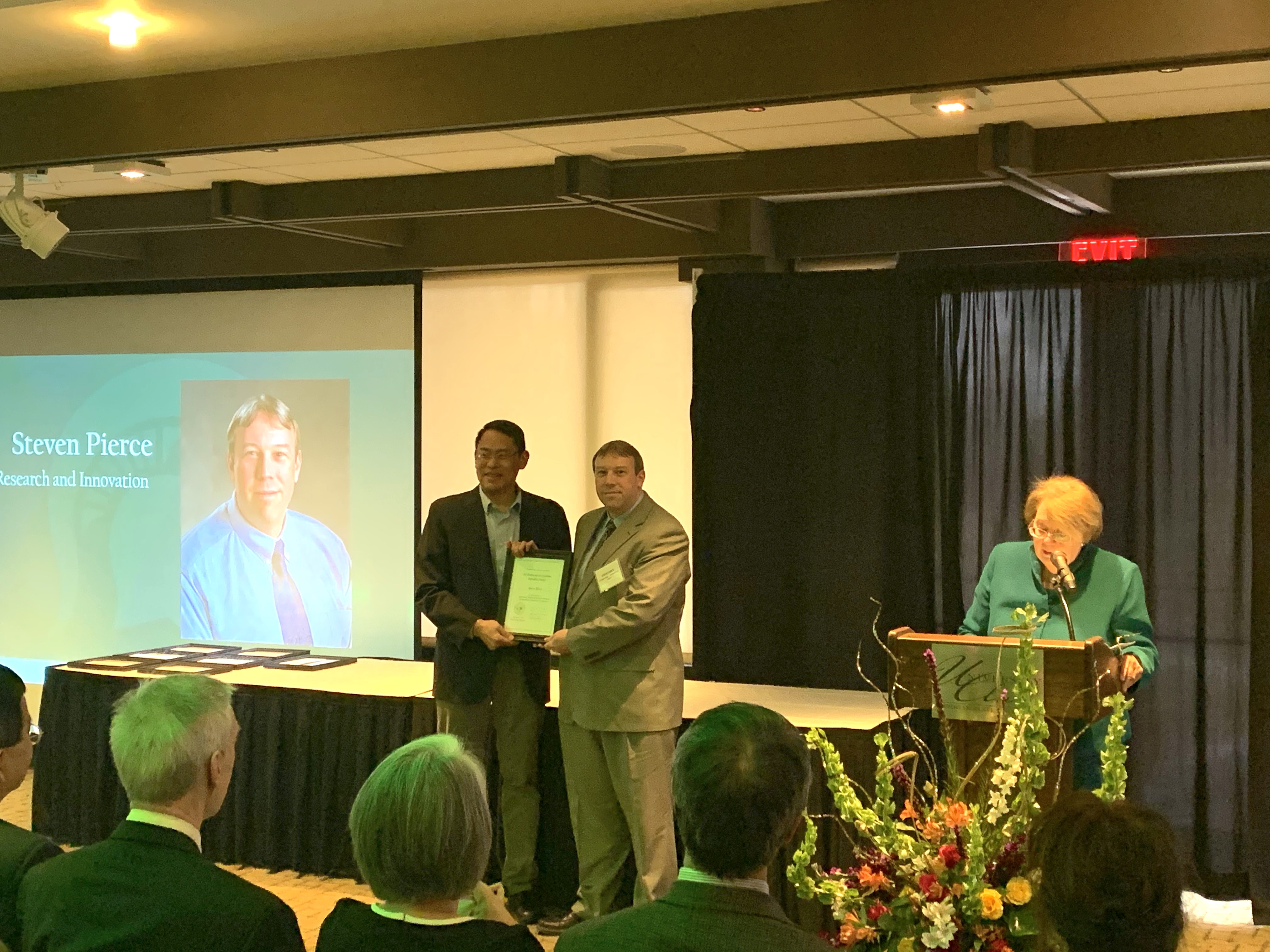 Steven Pierce receiving award