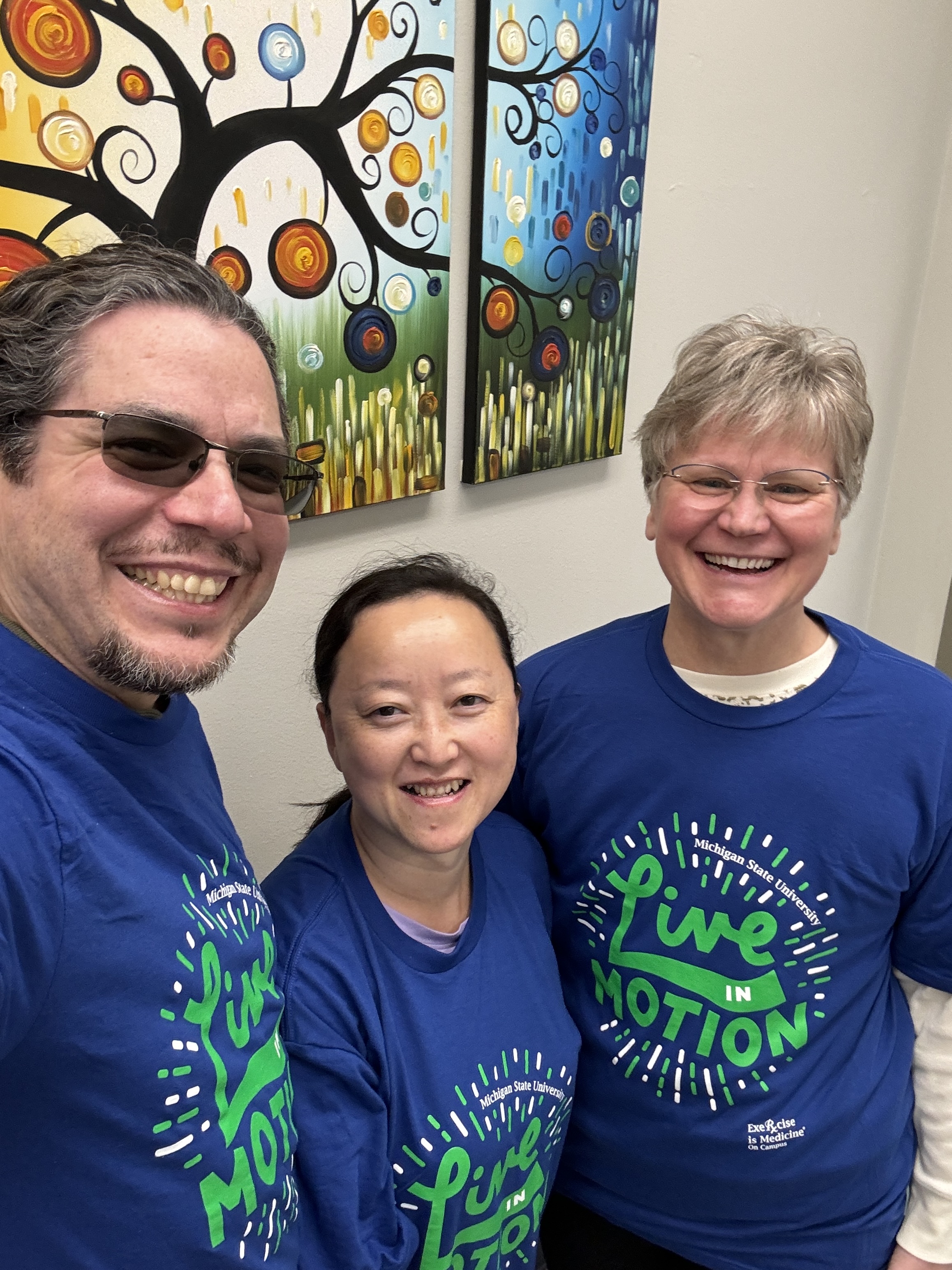 CSTAT team wearing Live in Motion t-shirts